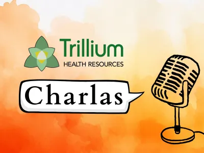 un microfono en un fondo naranja con la palabra "charlas"