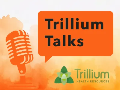 A microphone on a orange background with the message "Trillium Talks"