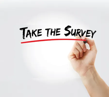 a hand writen in black ink "take the Survey"