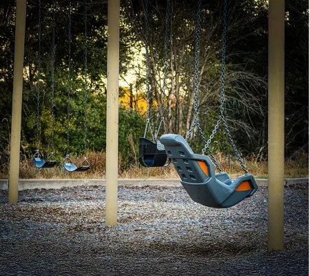 A picture of a Accessible swing in a playground