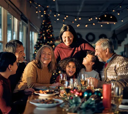 A family celebrarting holiday around a table